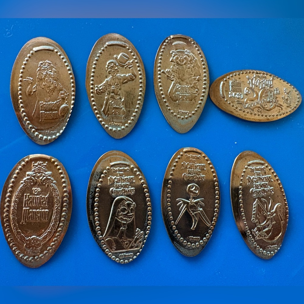 Set of 8 Haunted Mansion and Nightmare Before Christmas pressed pennies.